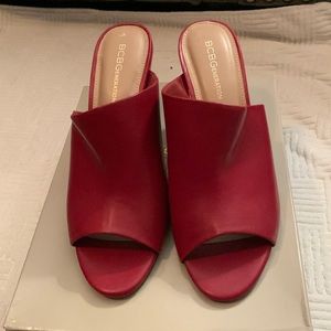 Red BC BG mules, beautiful red black heel 4 inches looks not a leather,